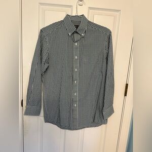 Men’s navy and green checked long sleeve dress shirt.